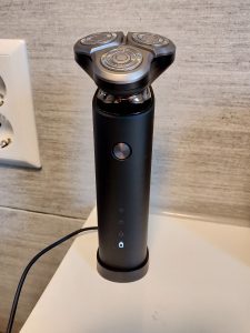 Xiaomi Mija Electric Shaver at charger